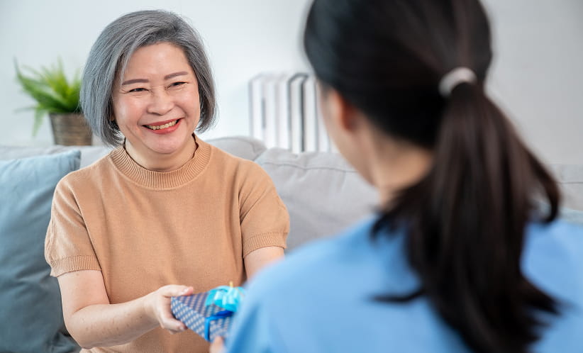 A woman receiving a gift