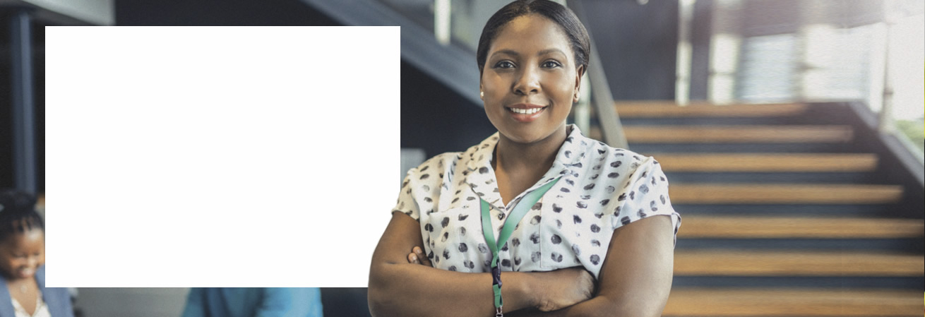 Public sector worker standing in atrium