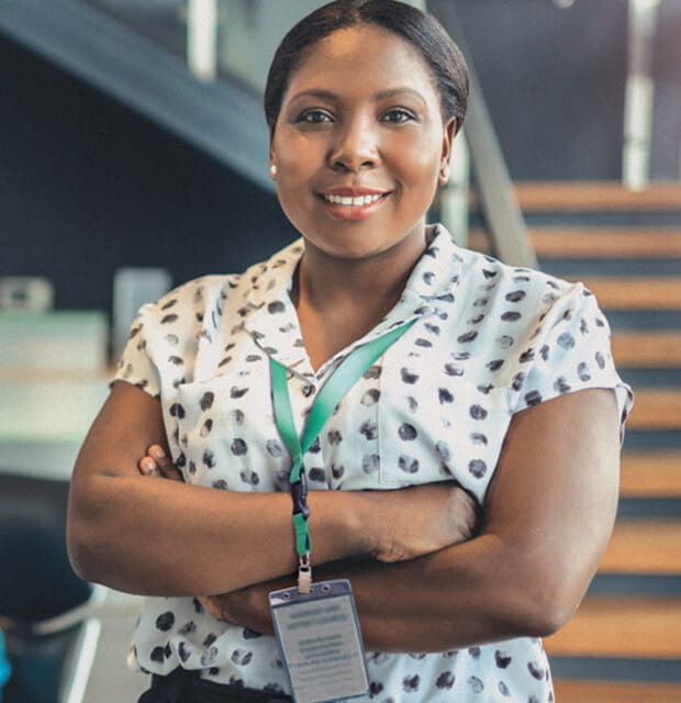 Public sector worker standing in atrium