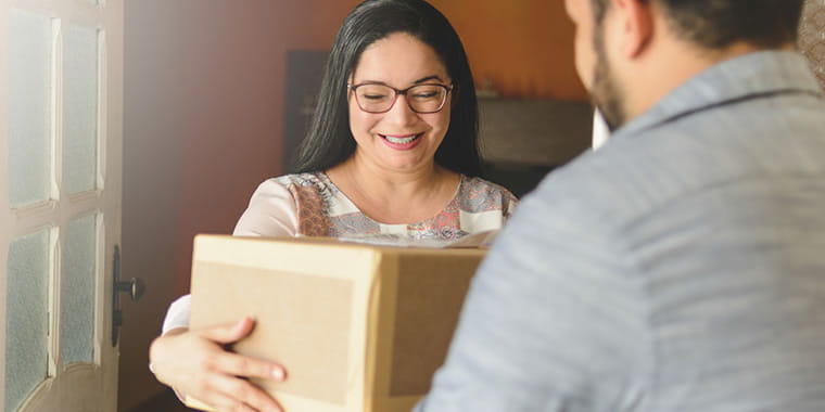 Woman receiving a parcel