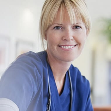 Smiling NHS worker