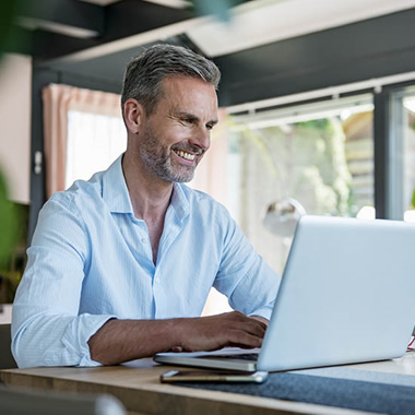 Man using a laptop to work