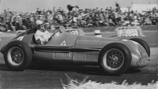 Black and white photo of a classic racecar