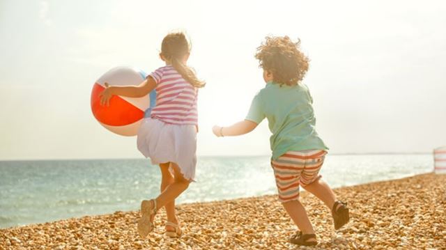 Children with a beach ball