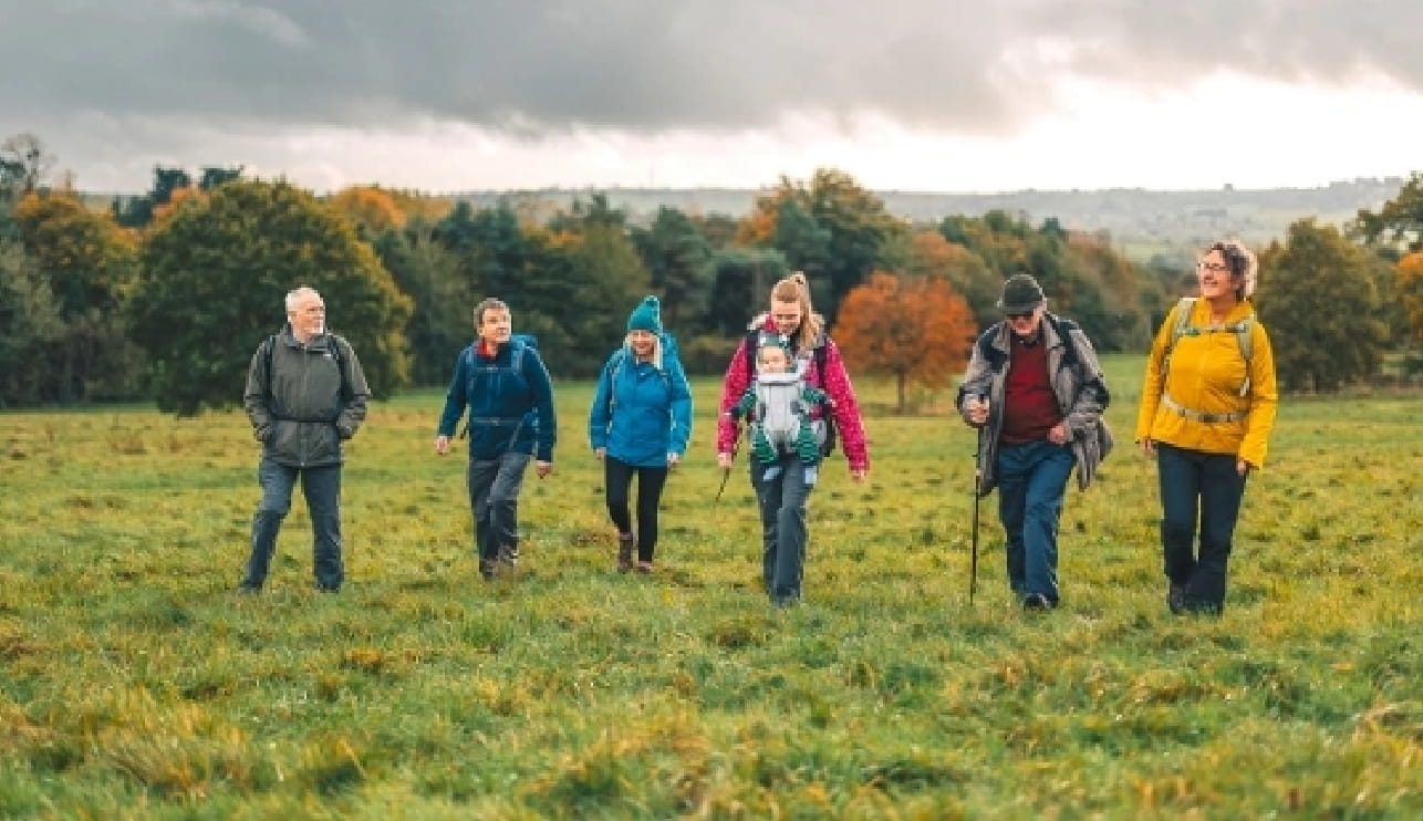 Ramblers walking in a field