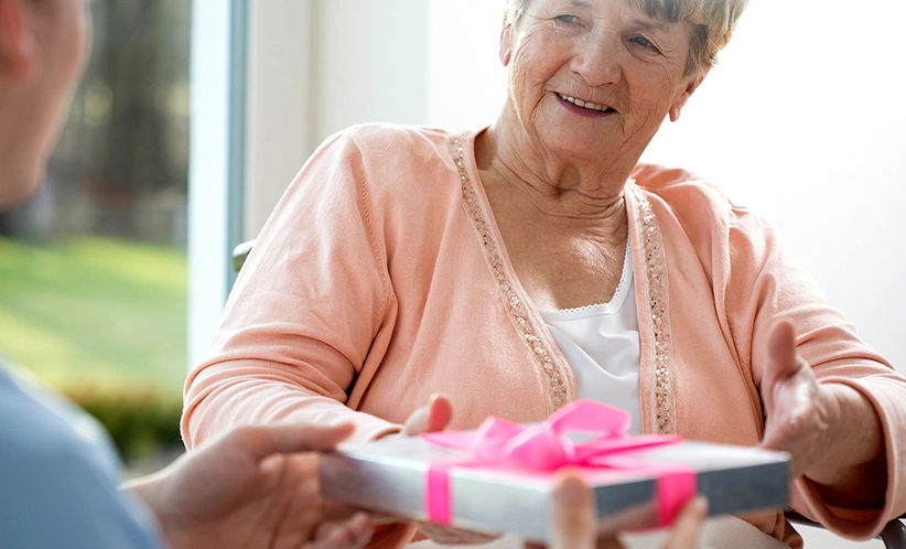 Woman receiving a gift