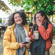 Couple of friends enjoying a coffee