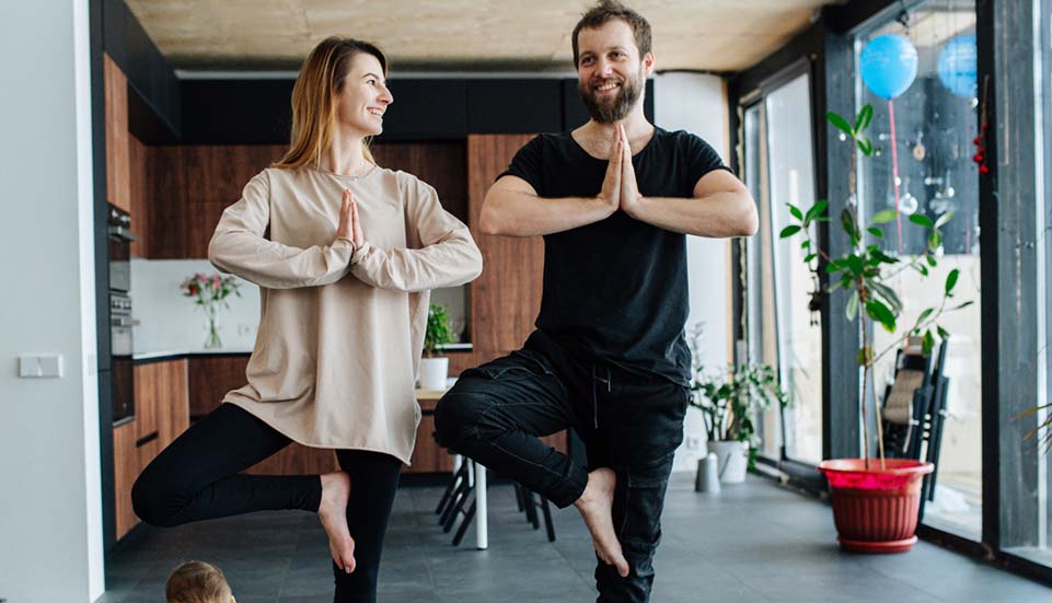 Couple doing Yoga